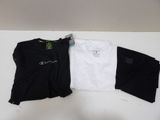three t - shirts are laid out on a white surface