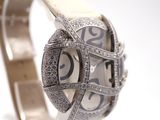 an image of a close up of a wrist watch with diamonds on it