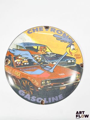 a clock that has a picture of a car and a dog on it