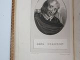 an open book with a picture of a man in a black coat