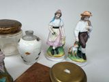 many figurines that are sitting on a table