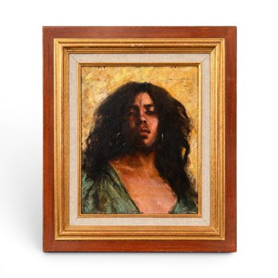 tableau représentant une femme aux cheveux longs, dans un cadre doré