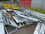 a lot of metal items that are sitting in the parking lot