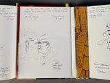 four pages of a book with drawings on them