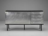 the sideboard is made of metal and has four drawers