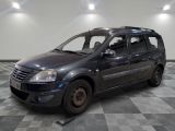 a picture of a small black car parked in a garage