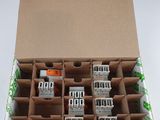 une boîte en carton contenant tout un tas de composants électriques