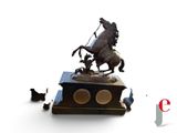 a statue of a horse and a dog on a pedestal
