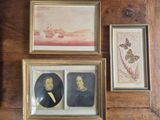 two framed pictures of men and a woman are on a wooden wall