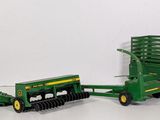 a toy tractor and a trailer with a trailer attached to it