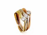 an image of a gold and diamond ring on a white background