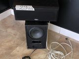 a speaker that is sitting on top of a speaker box