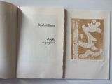an open book with a picture of a cat on it
