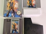 three game cartridges are sitting next to each other on a table