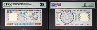 three different types of currency are on display in a display case