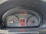 a close up of a car dashboard with a speedometer