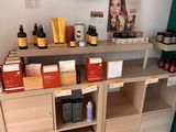 a shelf with a lot of different products on it