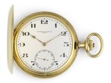 an image of a pocket watch with a gold case and roman numerals on the face