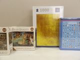 three puzzles are sitting on a table next to each other