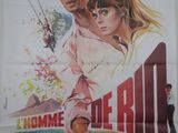 l'affiche du film « Home of the Rio », mettant en scène un homme et une femme
