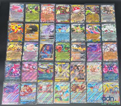 Lot de cartes Pokémon comprenant toutes sortes de cartes Pokémon différentes