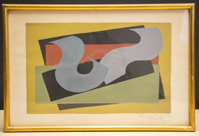 painting of abstract shapes in a gold frame on a black wall
