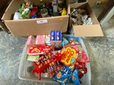 a box full of candy and candy bars on the floor