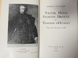 a book with a picture of a man in a black coat