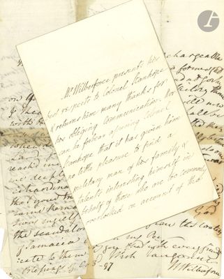 several old letters and a piece of paper with writing on them