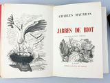 un livre avec l'image d'un oiseau et d'un nid d'oiseau