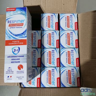 a box of toothpaste and a box of toothpaste on a table