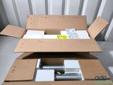 a cardboard box that has some kind of electronic device inside of it