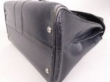 black leather clutch bag with rivets and rivets