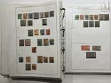 two pages of a book with different stamps on them