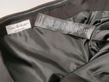 a close up of a suit case with a label on it