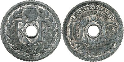 a close up of two silver coins on a white background