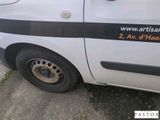 a white van with a black stripe on the side of it