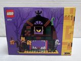 the box is open to show the contents of a lego set