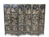 an image of a black and gold room divider with flowers and birds