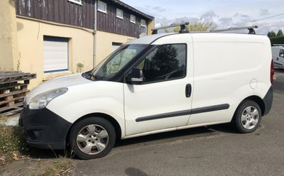 a white van parked on the side of the road