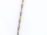 an image of a necklace with a cross on it