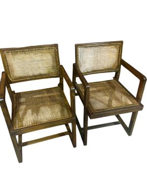 PIERRE JEANNERET (1896-1967) Paire de fauteuils "Cane seat b…