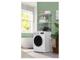 une photo d'un lave-linge et d'un sèche-linge blancs dans une pièce