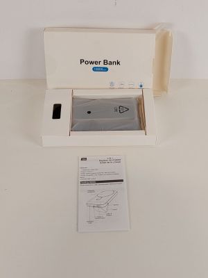 a box with a power bank inside of it on a table
