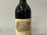 a bottle of wine that is sitting on a table