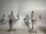 pair of antique silver plated candelabs on stands