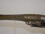 a gun that is on display in a museum