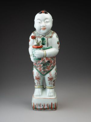 an image of a statue of a man holding a potted plant