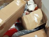 a pile of boxes that are sitting on the floor