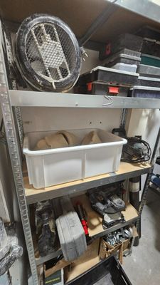 a shelf with a lot of tools on it